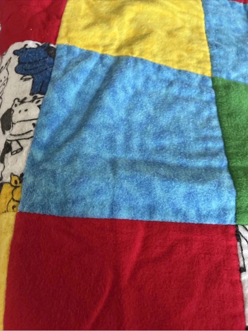 Multi-Color Patchwork Cow Print Baby Quilt - Red, Yellow, Blue, Green